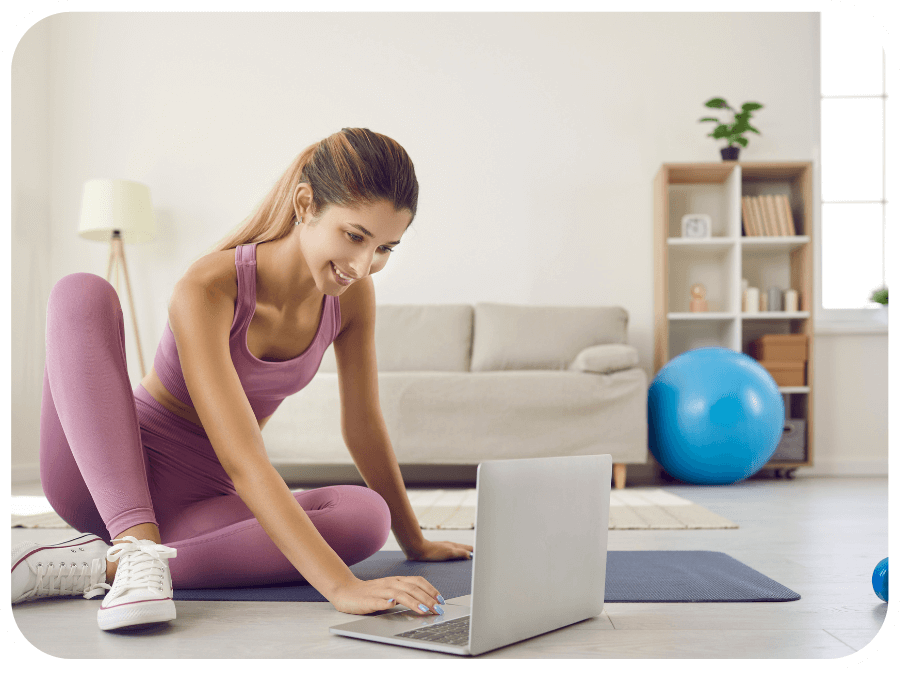 Personal trainer on laptop